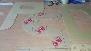 Jasa laser cutting akrilik putih susu bening